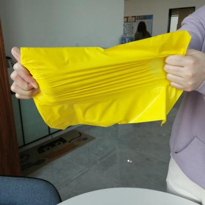 China Supply Waterproof Stock Yellow Color Plastic Courier Bag Poly Express Packing Ads Mailing Bags For Clothes for sale