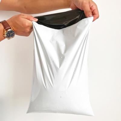 China Large Size 50x60 Cm Poly Waterproof Express Delivery Waterproof Tote White Mailing Bag for sale