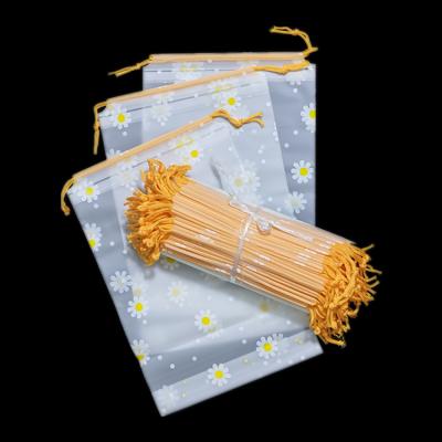 China Wholesale Disposable Beautiful Flower Nylon Drawstring Plastic Bag For Clothing Package for sale