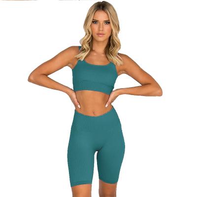 China Running Antibacterial Quick Dry High Five Point Sports Seamless Elastic Bra Yoga Wear Fitness Pants Shorts Suit Women for sale