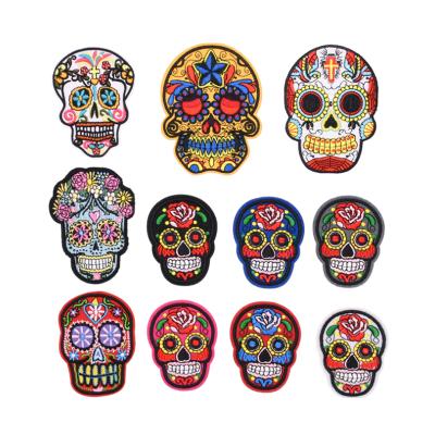 China Eco-Friendly Skull Heads Shape Custom Iron On Badge Embroidered Patches For Apparel for sale