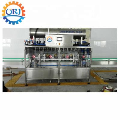 China Food Tongda Beer Filling Machine Stainless Steel Wine Bottle Filler Gun With CO2 Pressure for sale