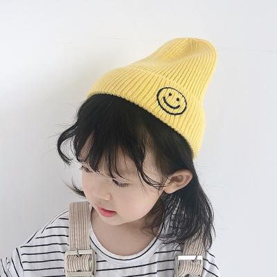 China COMMON Baby Autumn Winter Knitted Hat Warm Children's Hats Smile Face Hedges Hat For 1-5 Years Old Boys And Girls for sale