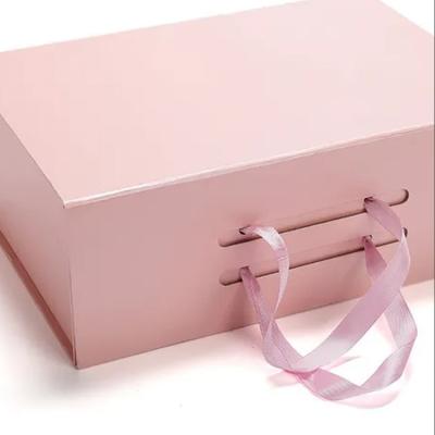 China Recyclable Custom Large Luxury Pink Rigid Logo Paper Packaging Magnetic Folding Gift Box For Packaging for sale