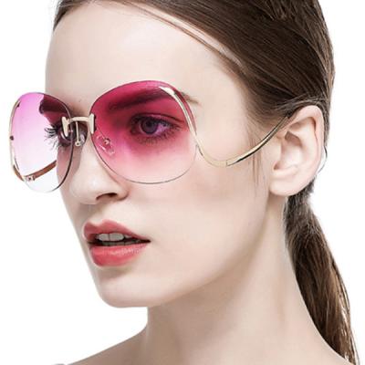 China Luxury Designer Sunglasses Wholesale Metal Sun Glasses Premium Texture Colored Rimless Party Sunglasses for sale