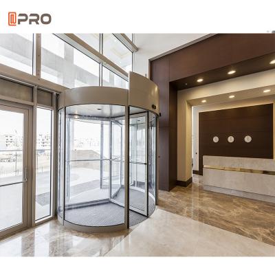 China Exterior white aluminum frameless glass sliding door hotel silent revolving automatic revolving doors windproof for sale