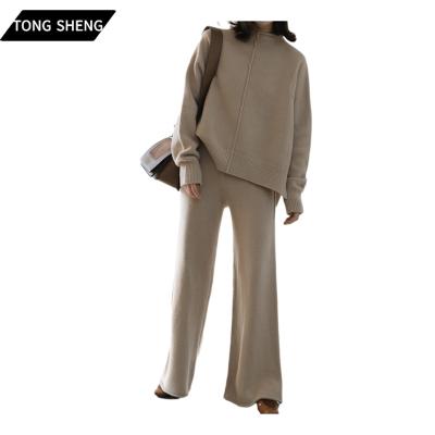 China Anti-wrinkle fashion woman dropped half shoulder turtle neck knitwear set plus size polyester alpaca wool sweater for sale