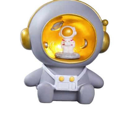 China Saving Money Bank Cartoon Astronaut Saving Pot Night Light Resin Ornaments Creative Children's Birthday Gift Deposit Box Piggy Bank for sale