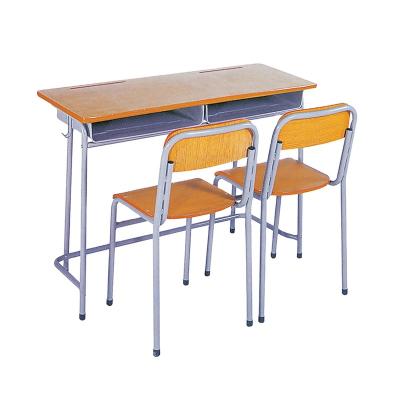 China Modern Low Price School Table Set Student Furniture Desk And Chair With Pencil Slot for sale