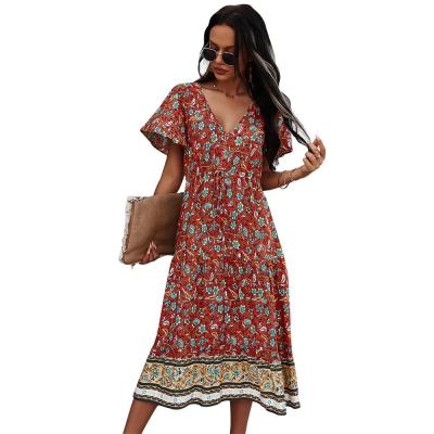 China DR10704044 Floral Dress Women Long Sleeve V-neck Fashion Loose Dress Summer Anti-static Short Maxi Dress for sale