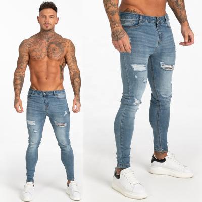 China Breathable USA Distressed High Street Style Hot Mens Breathable Fashion Destroyed Slim Fit Stretch Ripped Skinny Jeans In Blue For Men for sale