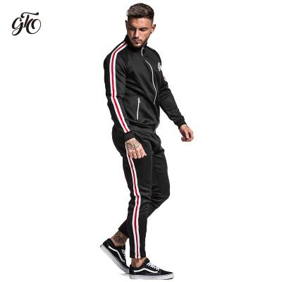 China Newest Design Men's Nice Gym Tracksuit Fashion Antibacterial Antibacterial Sports Set No NameTrack Suit With Side Stripe Red/Black Color for sale