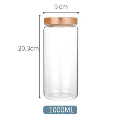 China Keep dry high borosilicate glass storage jar 1000ml with acacia wood for sale