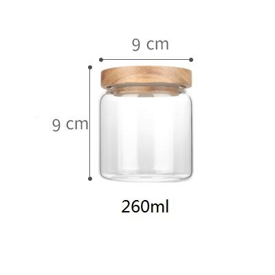 China Keep dry high quality borosilicate glass storage jar with acacia wood for sale