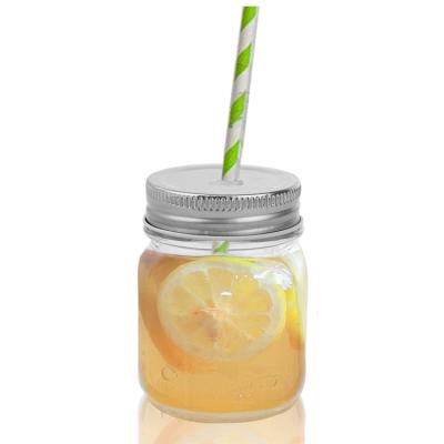 China Freshness Retention 450ml Embossed Glass Juice Drink Bottles With Straw for sale