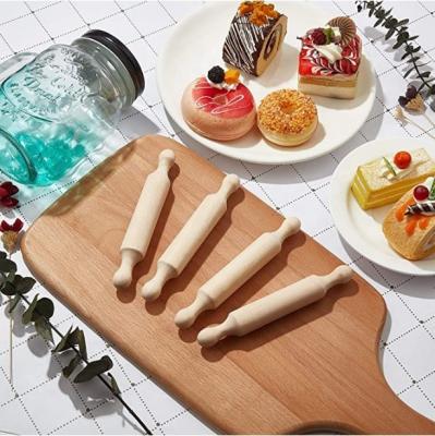 China Viable Most Selling Products Educational Toys Child Wooden Decoration Kitchen Toys Small Non-stick Rolling Pin Wholesale For Baking for sale