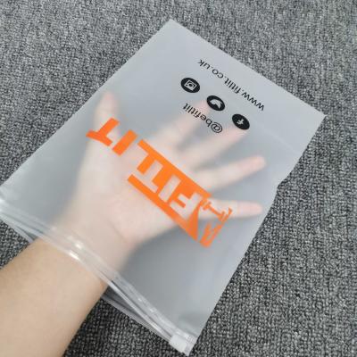 China BIODEGRADABLE Biodegradable And Sustainable Custom Transparent Plastic Zipper Bag For Clothing Packaging for sale