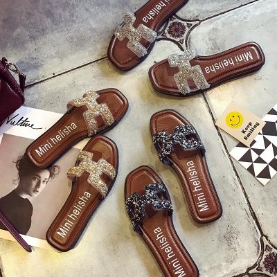 China Fashion trend fashion indoor and outdoor non-slip masonry sandals women's decorative slippers for sale