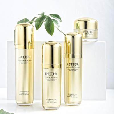 China 50g 30ml 80ml 120ml Luxury Empty Gold Cosmetic Face Lotion Circle Cream Bottle Jar Acrylic Package Set With Spray Pump for sale