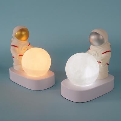 China Cartoon Design Astronaut Model 1W Contemporary Modern Decoration Study Room Bedside Table Led Night Light Book Reading Lamp for sale