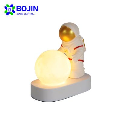 China Modern Cute Design Cartoon Figure Small Bedroom Study Room Table Lamp Customs Lead Indoor Night Light for sale