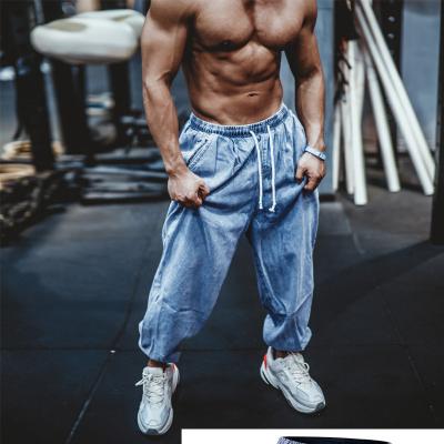 China 2021 Drop Waist Breathable European Jogger Pants Jeans Looking Mens Fashion Gym Jeans Loose Pants Style Trousers for sale