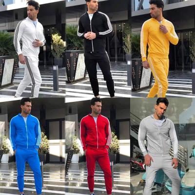 China Autumn Men Breathable Casual Running Sports Wear Side Stripe Mens Two Piece Polyester Tracksuits For Guys for sale