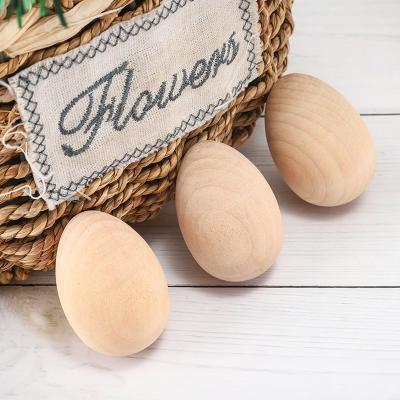 China Simply 2023 New Hot Sale Cheap Unfinished Wooden Easter Eggs for Painting Child Toy Wooden Craft Eggs and Display Ready to Paint Decoration for sale