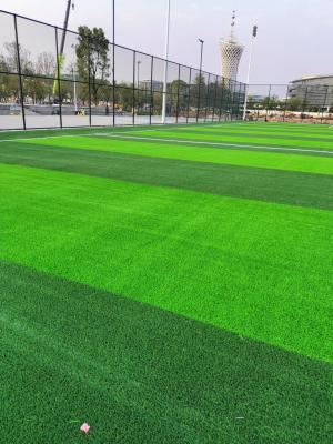 China Rubber Granules Synthetic Grass / Artificial Turf Dtex 8000-15000 Drainage System 50mm Pile Height for sale