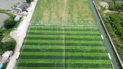 China 16.5 Stitches Artificial Football Turf With Rubber Granules Quartz Sand Effective Drainage System for sale