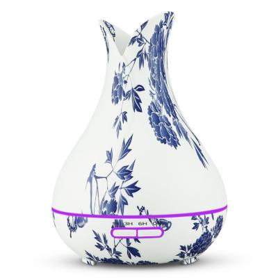 China Hot Sale Colorful LED Petal Vase Shape Blue& Remote Control White Porcelain Ultrasonic Air Diffuser Led Essential Oil Light rc Diffuser for sale