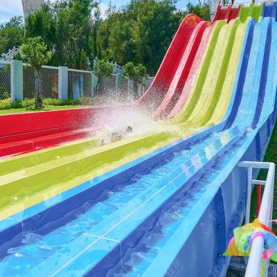 China 2020 Colorful Fiberglass Cowboy Amusement Slide Water Park 4 Lane Rainbow Water Slides For Adult for sale