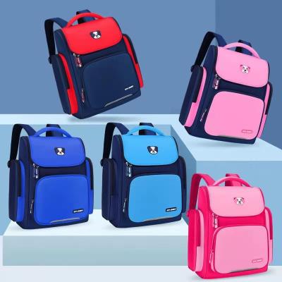 China Waterproof 2021 Wholesale Stock New Book Backpack Students Cheap Blue Pink Thorn Protection School Bag Elementary School Students for sale