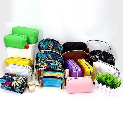 China Lady Travel Marble Makeup Bag PU Leather Small Cosmetic Pouch Waterproof Toiletry Bag for sale