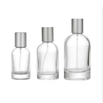 China Cosmetic Luxury Unique Transparent Personalized Perfume Spray Bottle 30ml 60ml 100ml for sale