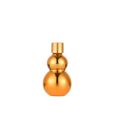 China 10ml 20ml 30ml 50ml 100ml Gold Essential Oil Cosmetic Bottle Gourd Shape Glass Bottle for sale