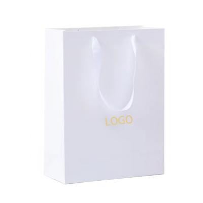 China Recycled Materials Logo Cardboard White Bag Gift Custom Packaging Jewelry Shopping Paper Bag With Your Own Logo for sale