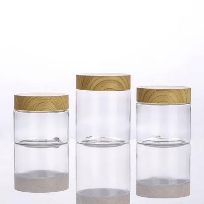 China Cosmetic Natural Cosmetic Container 80g 100g 120g Frosted Amber Clear Plastic Body Butter Pet Cosmetic Cream Jar With Bamboo Lid for sale