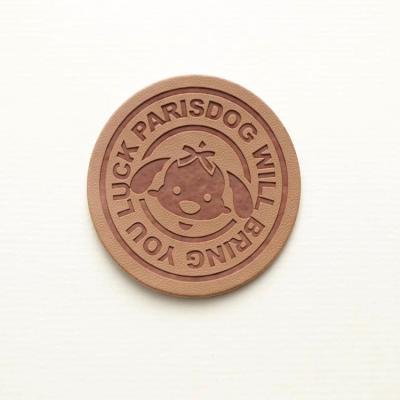 China Custom Brown Leather Round Leather Round Leather Jeans Accessories Label PU CLOTHING Sew On Logo Patches Label for sale