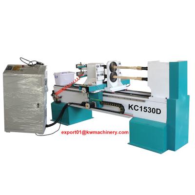 China LA FÁBRICA DE MADERA DEL TORNO DEL CNC DE KC1530D EN EL DOBLE DE CHINA ORIENTA EL TORNO DE TORNEADO DE MADERA DEL CNC en venta