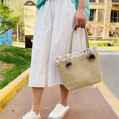 China Bolsos de mujer Beach Bag Straw Woven Bag Ins Shoulder Tote Bag New Summer Trend Wholesale Vintage For Women for sale