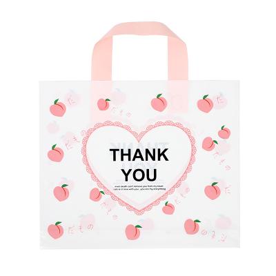 China Recycled Materials Gift Bag With Handle Thickened Large Peach Pattern Plastic Bag Supermarket Clothing Store Shopping Bag for sale