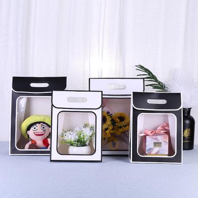 China Recyclable Custom Paper Window Opening Holiday Flower Gift Box Gift Bag for sale