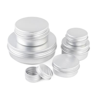 China Small Cosmetic Round Edge Lip Balm Jar Custom Printing Metal Round Tin Box Aluminum Can for sale