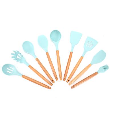 China Stocked Kitchen Heat Resistant Utensil Set Silicone Cookware Cookware Set Wooden Tools Handles Spatula Set Cookware for sale