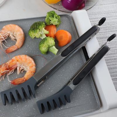 China Highest Quality Heat Resistance Food Grade Kitchen Sustainable Silicone Food Tongs With Comfortable Stainless Steel Handles for sale