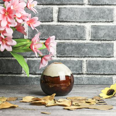 China New Round Shaped Ceramic Vases Vase Classical/Postmodern Creative Ceramic Crafts Decoration for Home or Office on the Desktop for sale