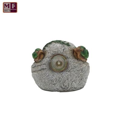 China Garden Decoration Polyresin Realistic Snail Two Standing On Stone Solar Light Statue For Garden By Pure Garden for sale