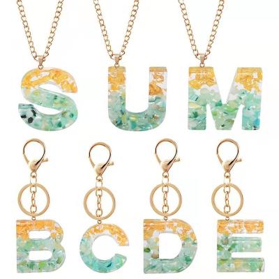 China Key Chains Key Ring Custom Colorful Bling Keychains Acrylic Resin Circle 26 Letter Fashion Alphabet Letters For Women for sale