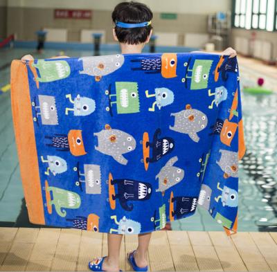 China Compressed Good Cheap 100% Cotton Printed Kids Poncho Beach Towel for sale